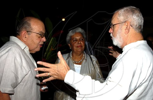 Winston Sill / Freelance Photographer
The Ambassador of the Republic of Chile Alfredo Garcia host National Day Reception, held at Millsborough Close on Friday night September 18, 2009. Here are Fred????  Kennedy (left); Marjorie???? Kennedy (centre); and Joseph A. Matalon (right).
