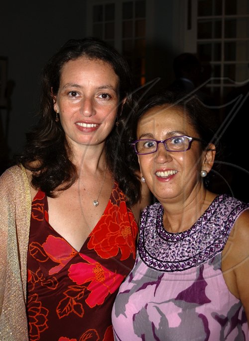 Winston Sill / Freelance Photographer
The Ambassador of the Republic of Chile Alfredo Garcia host National Day Reception, held at Millsborough Close on Friday night September 18, 2009. Here are Claudia Riguelme (left); and Santa Maria Garcia (right).