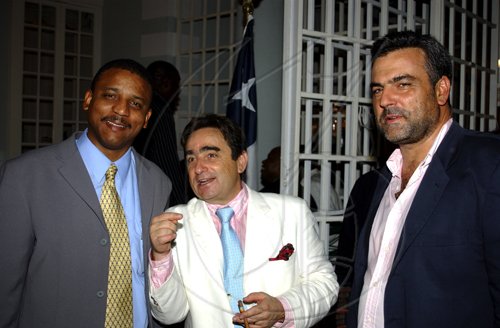 Winston Sill / Freelance Photographer
The Ambassador of the Republic of Chile Alfredo Garcia host National Day Reception, held at Millsborough Close on Friday night September 18, 2009. Here are the new Cuban Ambassador Yuri Ariel Gala Lopez (left); Alfredo Garcia (centre); and Jesus Silva (right).