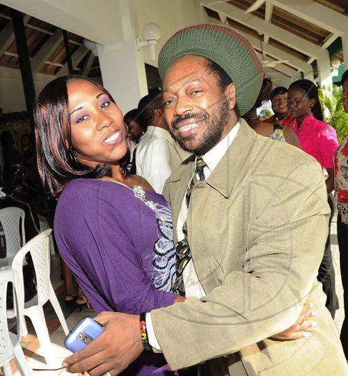 Rudolph Brown/Photographer
Donavon Campbell and Roxanne Clacken greet each other warmly.

**********************************************************a have a warm t the St. Catherine Co-operative Credit Union Christmas awards luncheon at Caymanas Golf and Country Club on Wednesday, December 22-2010