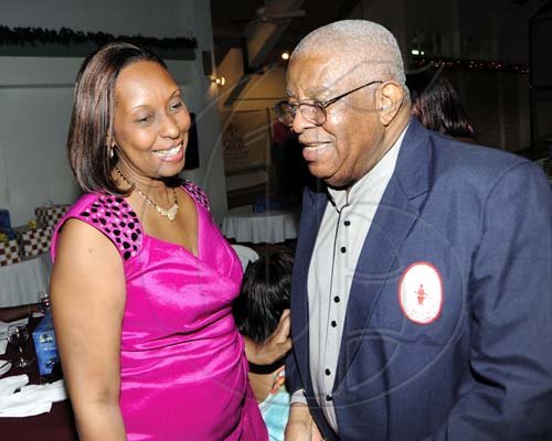 Rudolph Brown/Photographer
Donald Jones has a word Yvonne Purcell.


************************************************************************************ at the St. Catherine Co-operative Credit Union Christmas awards luncheon at Caymanas Golf and Country Club on Wednesday, December 22-2010