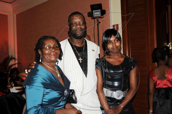 Publication: Social/Something Extra
Photo by Noel Thompson

Doris Morgan (left), wife of Clayton Morgan are with Bevon 'Duke' Earle, publisher and friend Chevele Campbell, at a celebration dinner held in honour of Clayton Morgan, at the Ritz Carlton Resort, Montego Bay, last Saturday (December 5, 2009).