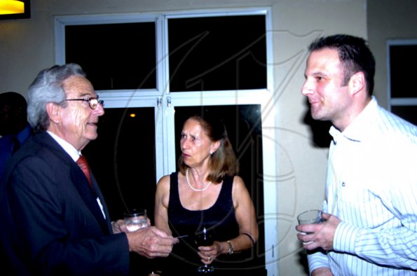 Winston Sill / Freelance Photographer
The Bangerter clan (from left) Peter, Fay and Ueli out to say their farewells.

Consular Corps host Cocktail Reception to say farewell to the British High Commissioner, held at Spanish Court Hotel, New Kingston on Wednesday december 2, 2009.