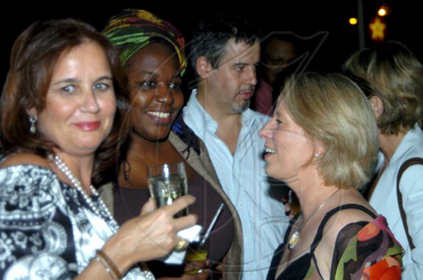 Winston Sill / Freelance Photographer
Something amuses (from left) Sara Silva, Ambassador Nafissatou Diagne and Dr Barbara Munske. In background is Belgian Ambassador Frederic Meurice.
Consular Corps host Cocktail Reception to say farewell to the British High Commissioner, held at Spanish Court Hotel, New Kingston on Wednesday december 2, 2009.