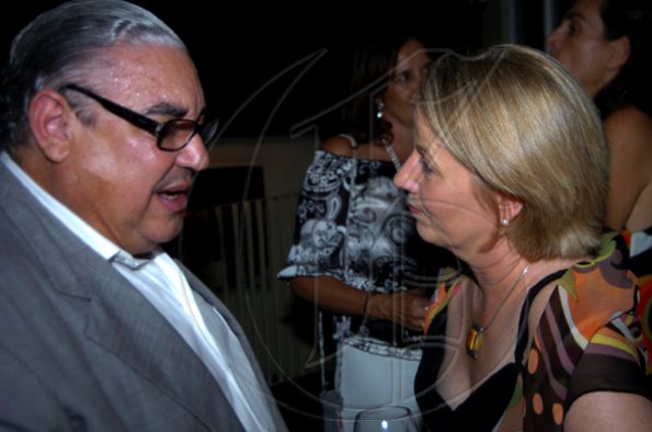 Winston Sill / Freelance Photographer
Robert MacMillan gives his own personal goodbyes to Dr Barbara Munske.

Consular Corps host Cocktail Reception to say farewell to the British High Commissioner, held at Spanish Court Hotel, New Kingston on Wednesday december 2, 2009.