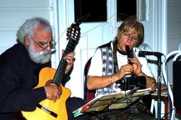 Winston Sill / Freelance Photographer
Norman McCallum and Rosina Moder keep the guests entertained with their soothing, wide repertoire.

The Consular Corps of Jamaica presents High Tea and Unveiling of Plaque, held at King's House, Hope Road on Thursday January 21, 2010.