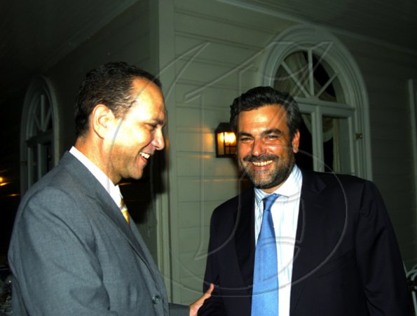 Winston Sill / Freelance Photographer
Dean squared! Dean of the Consular Corps of Jamaica William Tavares-Finson (left) jokes with dean of the Diplomatic Corps Ambassador Jesus Silva of Spain.

presents High Tea and Unveiling of Plaque, held at King's House, Hope Road on Thursday January 21, 2010.