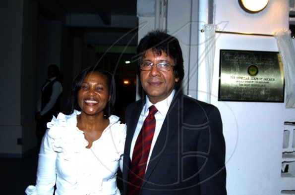 Winston Sill / Freelance Photographer
Lady Allen shares a pic with Honorary Consul to Ukraine Kenny Benjamin.

The Consular Corps of Jamaica presents High Tea and Unveiling of Plaque, held at King's House, Hope Road on Thursday January 21, 2010.