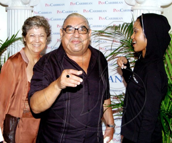 Winston Sill / Freelance Photographer
The always jovial Robert MacMillan is up to his tricks again with Marie Sigurdsson (left) and PanCaribbean's Camille Tenn. 

Consular Corps of Jamaica host Reception for  Premiere of the movie Eclipse, held at Carib Cinema, Cross Roads on Tuesday night July 6, 2010..