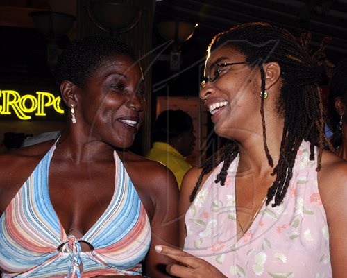 Colin Hamilton/freelance photographer
Nerma James (L) and Jacinth Lindo joke around during the Jamaica Cricket Festival 2010 Media Launch at the Acropolis Gaming Lounge on Tuesday March 9, 2010.