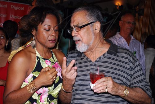 Colin Hamilton/freelance photographer
"We are both Hamiltons", seems to be what Howard Hamilton is saying to Tracy Hamilton at the Jamaica Cricket Festival 2010 Media Launch at the Acropolis Gaming Lounge on Tuesday March 9, 2010.