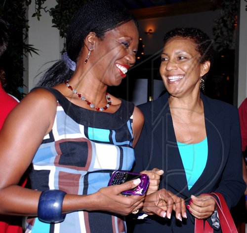 Colin Hamilton/freelance photographer
From left, Millicent Lynch and Lystra Sharp shares a joke at the Jamaica Cricket Festival 2010 Media Launch at the Acropolis Gaming Lounge on Tuesday March 9, 2010.