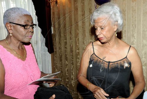 Rudolph Brown/Photographer
Lion Brenda Scarlett-Miller,(right) with Happy Scott, President of the Lions Club of St. Andrew Central at the Club 18th anniversary celebration at Hotel Four Seasons on Sunday, March 7-2010