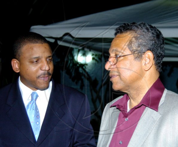 Winston Sill / Freelance Photographer
Cuban Ambassador Yuri Gala Lopez (left) may be talking diplomatic relations with Deputy Prime Minister Dr Ken Baugh at the Cuban National Day reception, held at Millsborough Avenue on Friday night.

************************************************************************************ January 8, 2010.