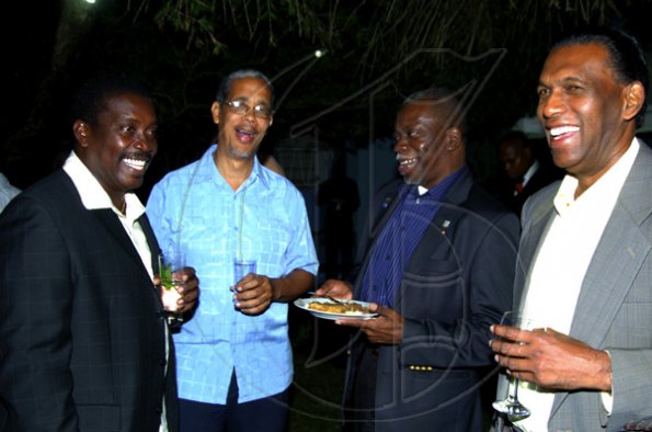 Winston Sill / Freelance Photographer
Local Government boss Bobby Montague (left) finds the funny side of things with (from second left) Paul Burke, Everton Hannam and Billy Heaven.

Cuban Ambassador host National Day Reception, held at Millsborough Avenue on Friday night January 8, 2010.