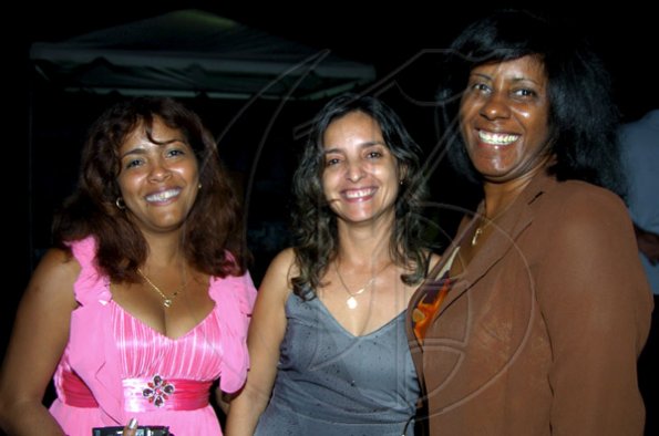 Winston Sill / Freelance Photographer
Smiling senoritas (from left) Milaidis Zorrilla, Ammia Gallo and Yamila Dinza enjoying the reception.

Cuban Ambassador host National Day Reception, held at Millsborough Avenue on Friday night January 8, 2010.