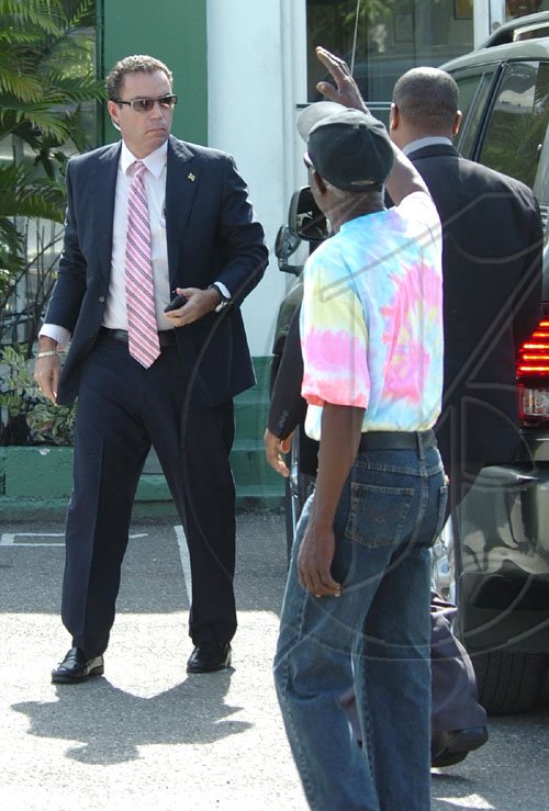 Rudolph Brown/Chief Photographer
Daryl Vaz, greets by members of the JLP after the Circuit Court ruling of the Dabdoub/Vaz case at the Jamaica Labour Party Headquarter on Friday, February 27-2009.