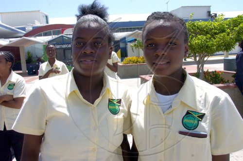 Ricardo Makyn/Staff Photographer.
Left Teashian Thomas and Trudy Carter both leading Goalscorers for Jamaica in the recently held qualifying competition in Dominica for Jamaica on arrival at the Norman Manley International Airport on Tuesday 29.9.2009.