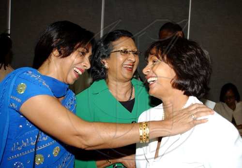 Winston Sill / Freelance Photographer
From left: Neryl Brydon, Joan Woodstock and Shirley Williams are having a grand time at the launch.

********************************************************************* he Edward Seaga Research Institute presents the official launch of two books, "Revelations and The Grenada Intervention", by Edward Seaga, held at the Hilton Kingston Hotel, New Kingston on Wednesday September 23, 2009.