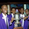 Peta-Gaye Clachar/Staff Photographer
Chairman of RJR Group Mr. Lester Spaulding (right) presents the School Challenge Quiz (SCQ) winning trophy to KC at the SCQ)Finals at TVJ Studios on Tuesday, March 31, 2009.from left is the captain of the team Kenneth Peart,Alain N' Dalla, Roland Douglas and Oral Lawson.