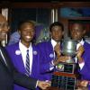 Peta-Gaye Clachar/Staff Photographer
Chairman of RJR Group Mr. Lester Spaulding (left) along ith guest speaker Mr. Lascelles Chin (right) presents the School Challenge Quiz (SCQ) winning trophy to KC at the SCQ)Finals at TVJ Studios on Tuesday, March 31, 2009.from left is the captain of the team Kenneth Peart,Alain N' Dalla, Roland Douglas and Oral Lawson.