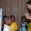 Peta-Gaye Clachar/Staff Photographer
Aline Luna Leclere-less (right) Director of the Center for Language and Culture (CLC) teaches some students  from the Little Darlings Early Childhood Center in Harbour View Kingston 17 to sing in french while at the Dudley Grant Memorial Trust Early Childhood 2009 Development Expo at the Jamaica Pegasus on Tuesday, July 7, 2009. Aline specializes in teaching basic school children in three languages, Spanish, French and English .From left to right is  Antwoine Chung, Julene Williams, Janielle Robinson and Rajhiem Blake (partially hidden).