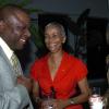 Peta-Gaye Clachar/Staff Photographer
Evan Hemans (left) Vice President of Managed Services at Fijitsu hangs with Valerie Grant the Executive Personal Assistant at Fijitsu and Stacy Budhi McLean (right) Fijitsu's Business Development manager for NCB at the Fijitsu executive cocktail reception at their Belmont Road office on Thursday, March 12, 2009.