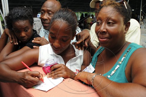 Ian Allen/Staff Photographer
Delegates eagerly awaits the results in the Jamaica Agricultural Society elections.
