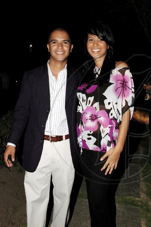 Colin Hamilton/freelance photograper
Haven't seen Adrien Lemaire (left) around much, but the former cultural attache at the French Embassy was out with lady love Danielle Crosskill at the National Day reception. Word is he's now a budding businessman. Voila!

 held at the Ambassador's residence on Tuesday July 14, 2009.