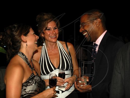 Colin Hamilton/freelance photograper
Ricardo Allicock has Mexican Ambassador Leonora Rueda (centre) and her daughter Valentina Gonzalez in stitches.


French National Day reception held at the Ambassador's residence on Tuesday July 14, 2009.