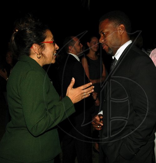 Colin Hamilton/freelance photograper
Cuban Ambassador Gisela Garcia talks business with ODPEM Director General Ronald Jackson. 


French National Day reception held at the Ambassador's residence on Tuesday July 14, 2009.
