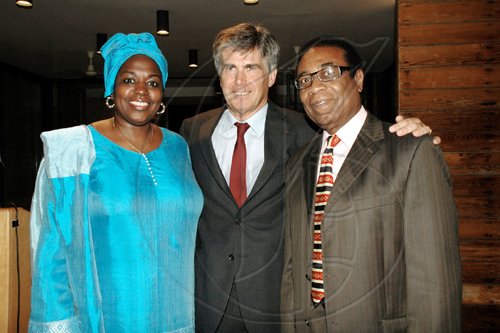 Colin Hamilton/freelance photograper
This is a 'French connection' indeed. French Ambassador Marc-Olivier Gendry (centre) with fellow French-speaking diplomats Ambassador Nafissatou Diagne (left) of Senegal and Max Alce, charge d'affaires at the Haitian Embassy. They were celebrating at France's National Day reception held at Ambassador Gendry's residence on Hillcrest Avenue on Tuesday.


 July 14, 2009.
