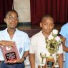 Rudolph Brown/Chief Photographer
First prize winner Timothy Hitchener, (centre) of Our Lady of the Angels Prep school, second prize, Jordan Salmon, (left) of Mona Preparatory school and third prize Ashley Clarke of St. Andrew Prep of the Lay Magistrates Association of Jamaica  National Essay competition 2009 at Holy Cross Church Hall, 17 Half Way Tree Road in Kingston on Wednesday, June 17-2009