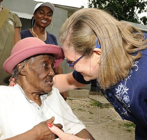 Rudolph Brown/Chief Photographer
Professor Denise Eldemire- Shearer, (right) Patron of the National Council for Senior Citizens greets Centenarian Ambrozine Lindsay 100 Year Old at the National Council for Senior Citizens, Ministry of Labour and Social Security presents Centenarians' Day celebration and intergeneration Day at the National Council in Kingston on Wednesday, May 20-2009