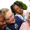 Rudolph Brown/Chief Photographer
Centenarian Catherine Reynolds, (right) tells her story to Professor Denise Eldemire- Shearer, Patron of the National Council for Senior Citizens and Merl Grove High School students (from left) Shaneek McPherson, Tiffany Gilbert and Kristen Rhone during the National Council for Senior Citizens/Ministry of Labour and Social Security Centenarians' Day celebration and Intergeneration Day at the council's offices in Kingston yesterday. Reynolds is 101 years old.