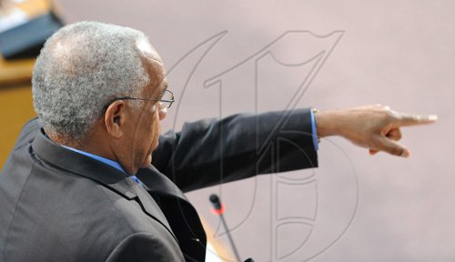 Rudolph Brown/Chief Photographer
Audley Shaw, Minister on Finance and the Public Service speaks on IMF in Parliament on Tuesday, July 21-2009.