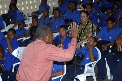 Ian Allen/Staff Photograper
Derrick Simon preach to second former of Jamaica College during a gospel crusade at the school on thursday.