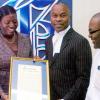 Ricardo Makyn/Staff Photographer.
The Gleaner's Managing Editor Jenni Campbell hands attorney-at-law Bert Samuels a plaque for Silver Pen Award winning letter of the day as Gleaner Editor in Chief Garfield Grandison looks on at the newspaper's North Street, central Kingston offices yesterday.