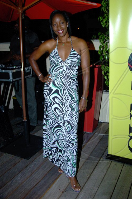 Winston Sill / Freelance Photographer
Pot of Gold Productions presents the Launch of the 2009 "Take Me Away Concert" with Richie Stephens and Friends, held at the Spanish Court Hotel, St. Lucia Avenue, New Kingston on Thursday March 26, 2009. Here is radio personality Roxene Nickle.