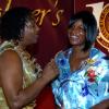 Winston Sill / Freelance Photographer
Maxine Simpson (right), mother of Olympian and Wolmer's old girl Shelly-Ann Fraser, accepts her daughter's award from Dr Verna Reid, president of the Wolmer's Girls' Alumnae. The occasion was the association's Centenary Dinner, Dance and Awards Banquet, held at the Jamaica Pegasus Hotel, New Kingston on Friday night April 24, 2009.