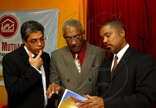 Winston Sill / Freelance Photographer
BUSINESS DESK:------ Victoria Mutual Building Society (VMBS) 130th Annual General Meeting, held at VMBS, Half Way Tree Road on Thursday July 30, 2009.Here are Richard Powell (left), President and CEO, VMBS; Roy Hutchinson (centre), Chairman, VMBS; and Michael McMorris (right), Board Member, VMBS.