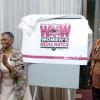 Peta-Gaye Clachar/Staff Photographer
Evelyn Scott honorary member and Hermione McKenzie (right) president of the Associates of Women Organizations in Jamaica unveils the anniversary logo at the tribute to women trailblazers and launch of womens media watch Jamaica 21st anniversary celebrations at the Hilton Hotel on Tuesday, March 3, 2009.