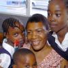 Rudolph Brown/Chief Photographer
Ivorine Thompson, receive roses from her students Kimmani Barrett, (right) Makenna Smith, (left) and Taravi Thomas on Teachers Day, at Windward Road Primary and Junior High at 141 Windward Road in Kingston on Wednesday May 6-2009.