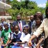 Ricardo Makyn/Staff Photographer.
From left behind School Children E.G.Barrett O.D.JP with Principal Winston Jackson and Reverend Phillip Robinson looks on asThe  Most Honourable Lorna Golding Wife of the Prime Minister  and Goldie Flaconer-Simpson Justice of the Peace Cut the Ribbon  at the Ceremony for the openning and renaming of the Gordon Town All Age School to the Louise Bennett-Coverley All Age on Thursday 4.6.2009.