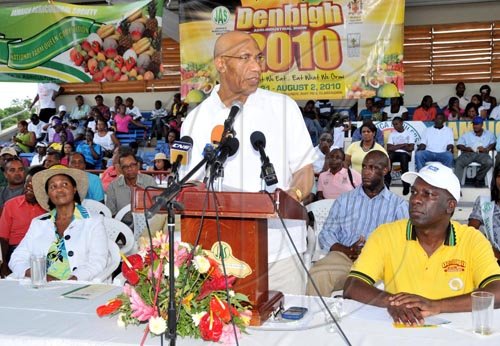 Contrbuted                                                                             Governor General, His Excellency the Most Hon. Sir Patrck Allen, addresses
day two of the 2010 Denbigh Agri- Industrial Show yesterday (August 1) in
May Pen, Clarendon. Listening are Her Excellency the Most Hon. Lady Allen
and First Vice President of the JAS, Norman Grant.