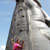 Norman Grindley/Chief Photographer
A girl takes time away from the flora and fauna on display at Denbigh to try out her rock-climbing skills yesterday.


Day two.
