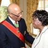 Rudolph Brown/Chief Photographer
Lorna Golding, (right) wife of Prime Minister Bruce Golding in discussion with Governor-General, Dr Patrick Allen,  after the Governor General, invested Desmond Blade with the Order of Jamaica, during the ceremony of investiture and presentation of National Honours and Award at Kings House, St Andrew on Tuesday. May 12-2009