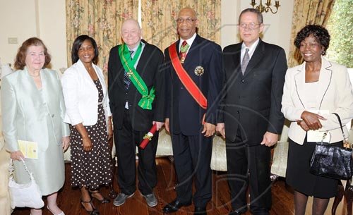 Rudolph Brown/Chief Photographer
Desmond Blade invested the Order of Jamaica on Mr. Blade during a ceremony of investiture and presentation of National Honours and Award at Kings House, St Andrew on Tuesday. May 12-2009