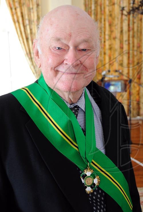 Rudolph Brown/Chief Photographer
Desmond Blade invested the Order of Jamaica on Mr. Blade during a ceremony of investiture and presentation of National Honours and Award at Kings House, St Andrew on Tuesday. May 12-2009