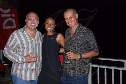 Janet Silvera
From left,  Co-owner of Margaritaville Caribbean, Ian Dear, Digicel's Trisha Thompson and CEO of Couples Resorts, Glenn Lawrence at the Blackberry Bold 9700 party at Blue Beat in Montego Bay on Wednesday night.